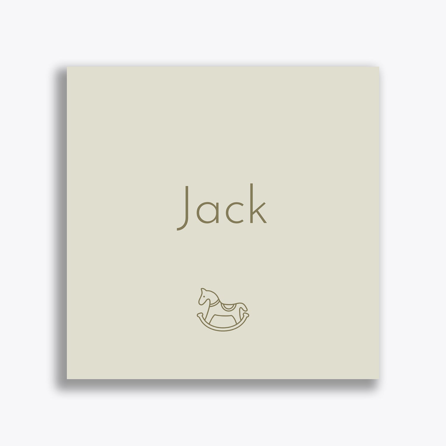 Een geboortekaartje voor baby Jack. Het geboortekaartje is helemaal gepersonaliseerd met een uniek lettertype en een schommelpaardje